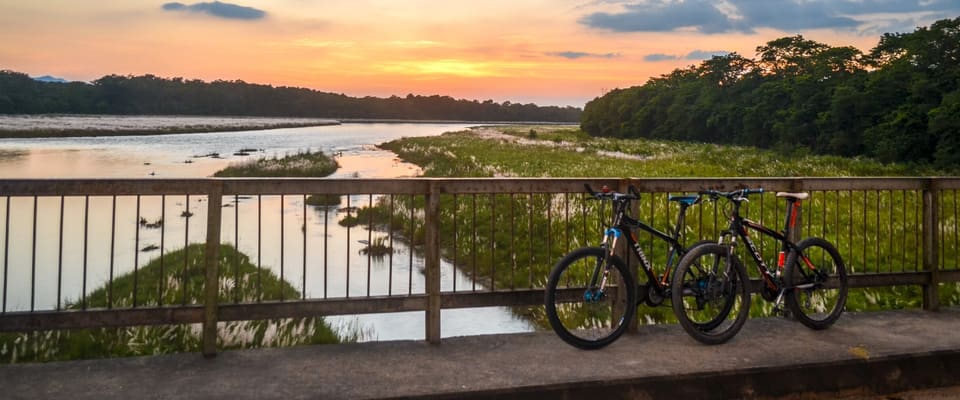 Evening light over the Narayani River seen from a riverside railing